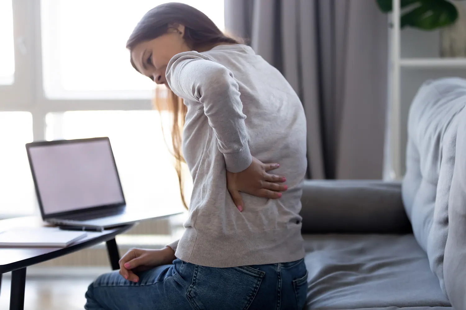 woman suffering from slipped disc