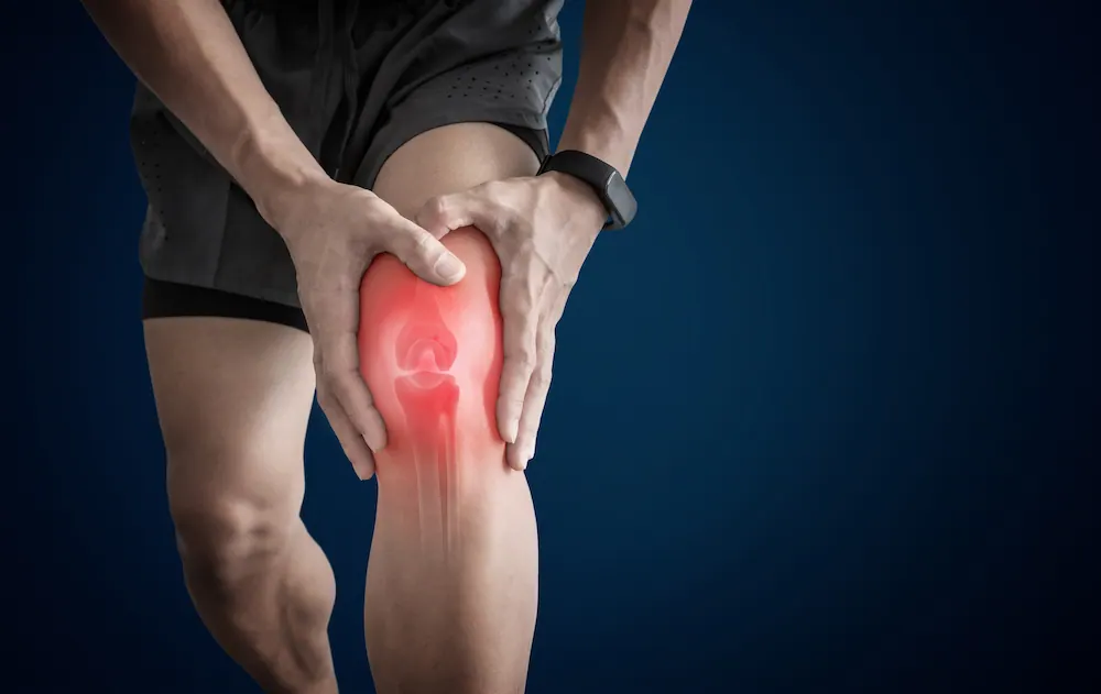 man suffering from overuse injury pain